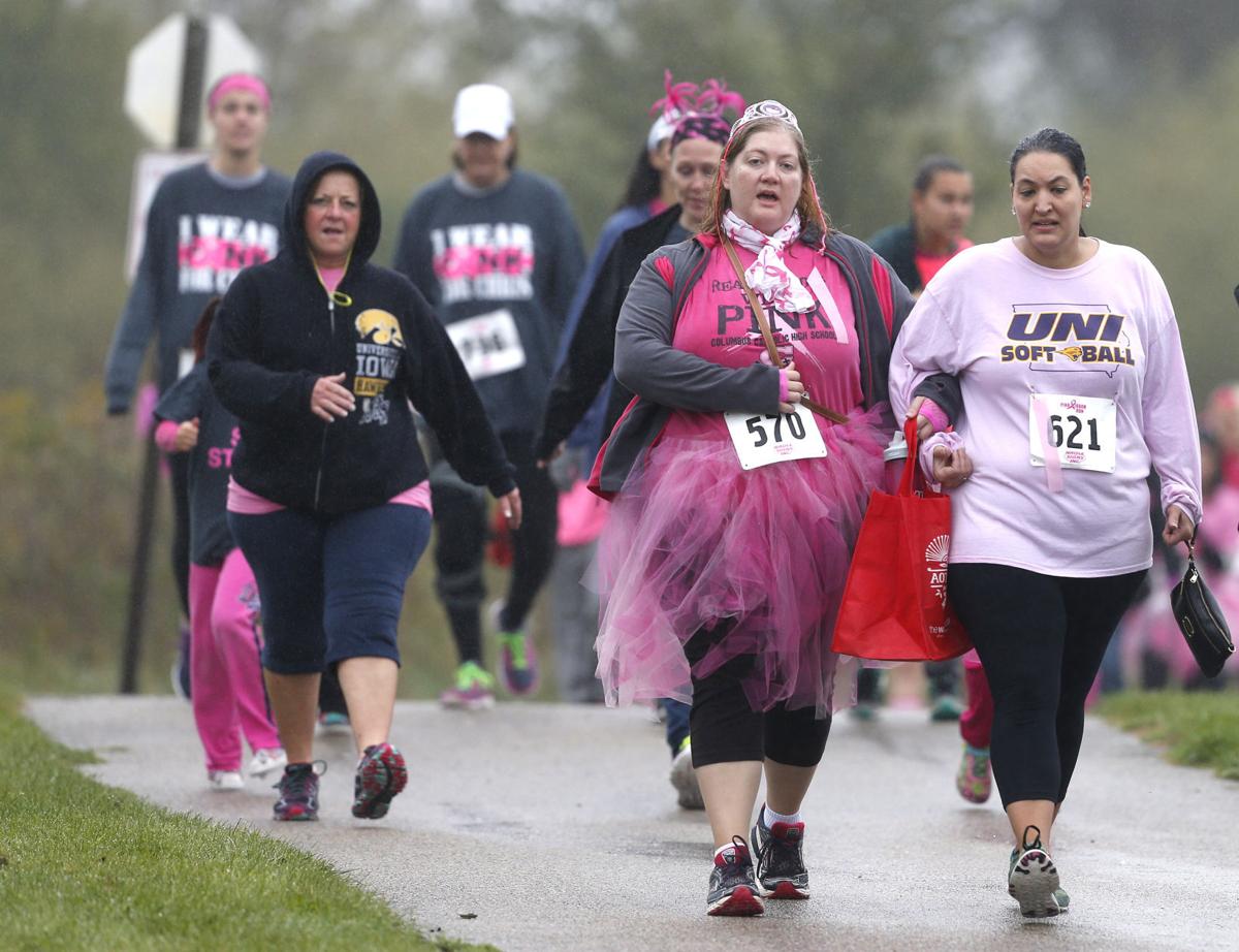 Pink ribbon run has record crowd despite water Local News
