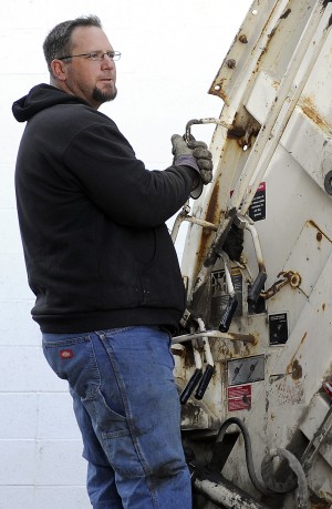 Longtime trash hauler loves his work — regular hours, constant work — except for the dirty parts