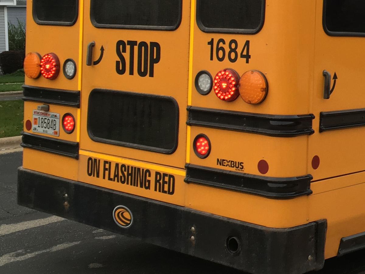Ordinance change means buses can now use red flashing lights to merge