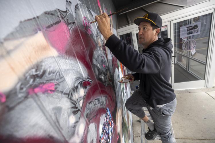 Montana Grizzlies receiver Bagley finishing Press Box mural