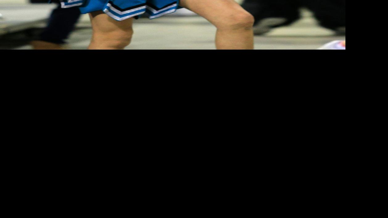 Lame Deer cheerleader Boys Basketball