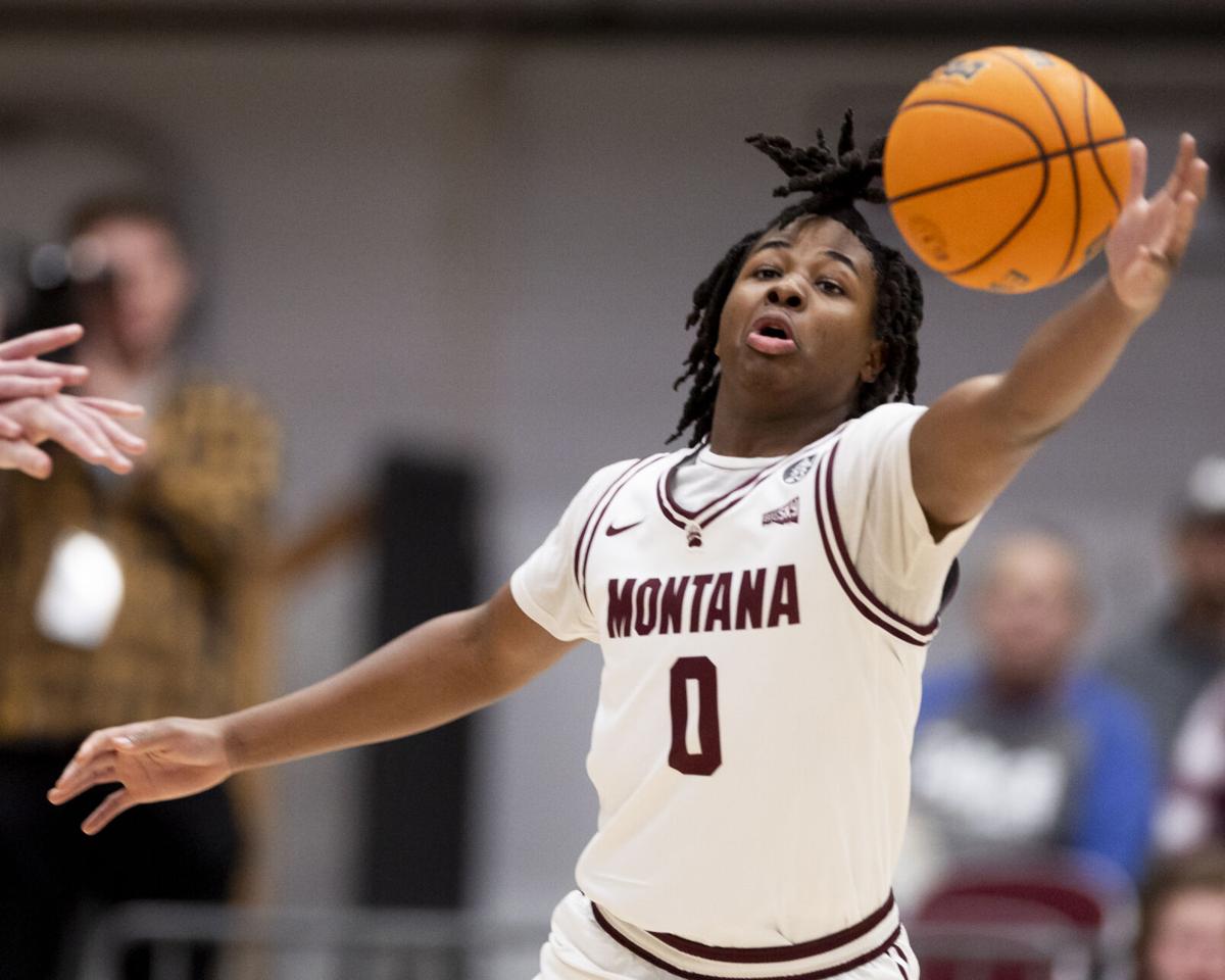 UM guard Money Williams back in Oakland after mother's death