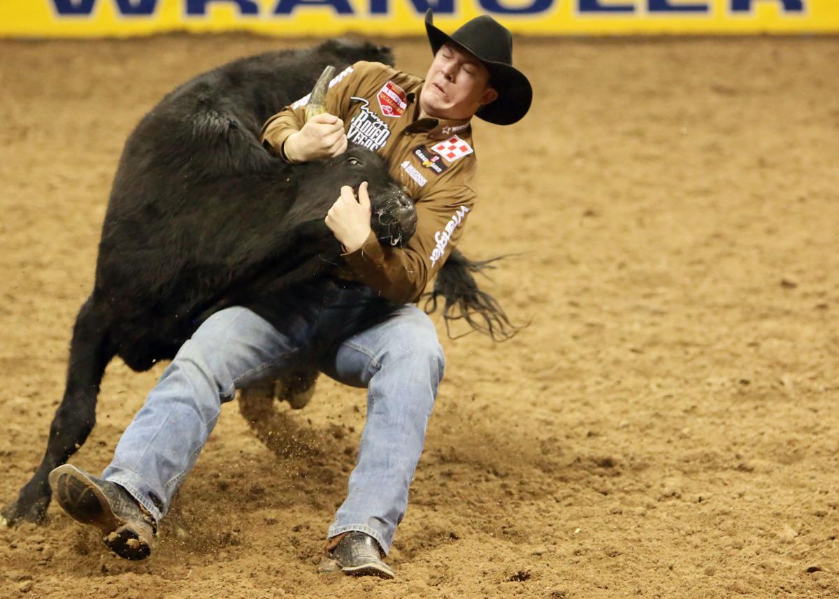 Helena's Ty Erickson maintains grip on steer wrestling at