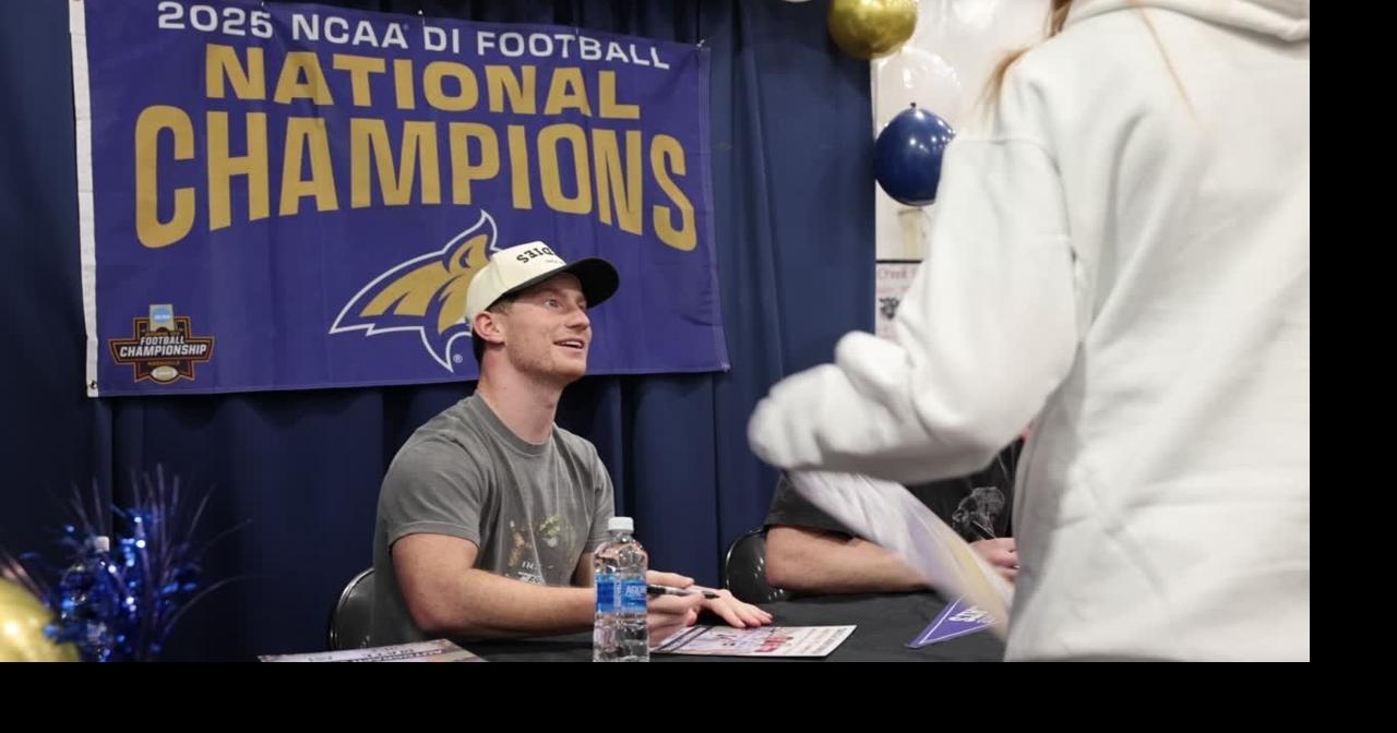 Montana State Football’s Taco and Caden Dowler sign autographs at MATE Show in Billings