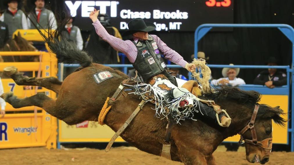 National Finals Rodeo Deer Lodge's Chase Brooks wins buckle at first
