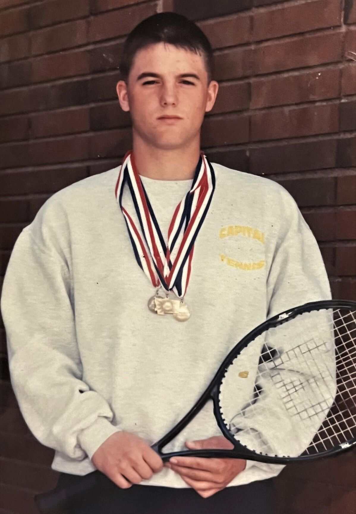 Curts Replays Capitals Todd Crum, 3-time State tennis champ