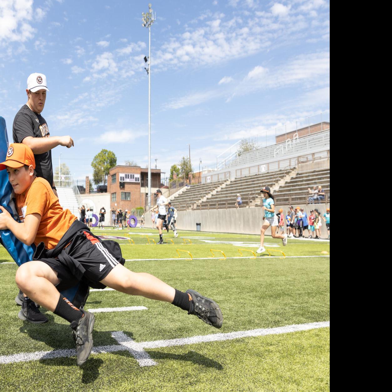 Youth and High School Football Camps featuring NFL players and coaches