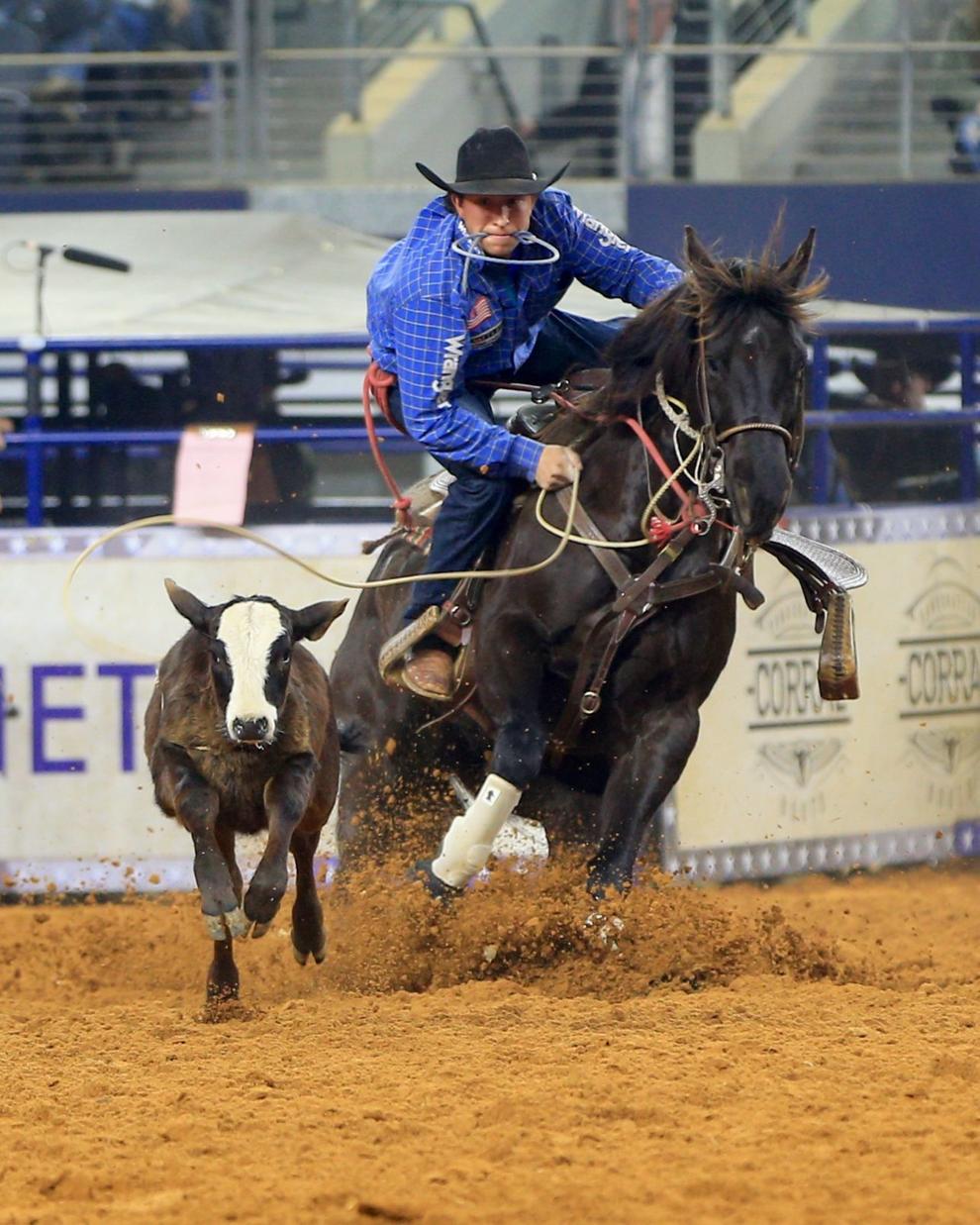 Miles City cowboy Haven Meged goes through the air in pursuit of