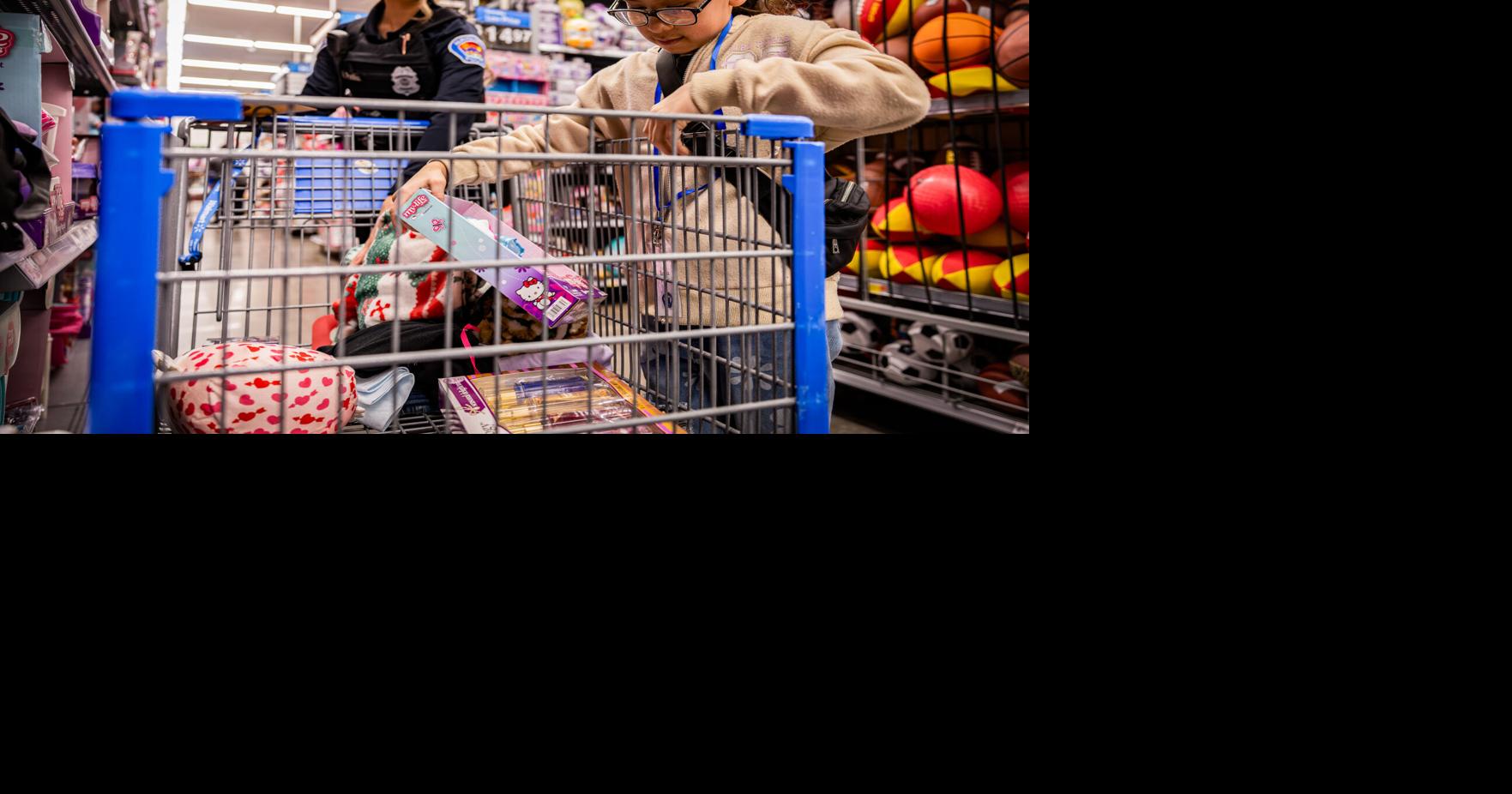 'A wonderful experience': Cops shop for kids at annual Christmas event