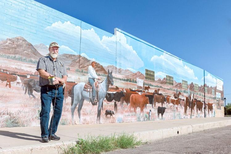 20250713-life-quarlesobit - Standing in front of mural