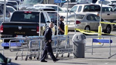 Police: Man shot at officers outside Walmart