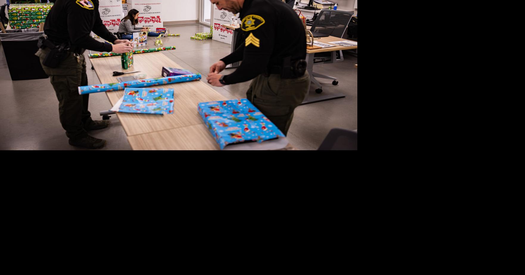 Putting a bow on it: BCSO wraps Christmas gifts and food boxes for families in need