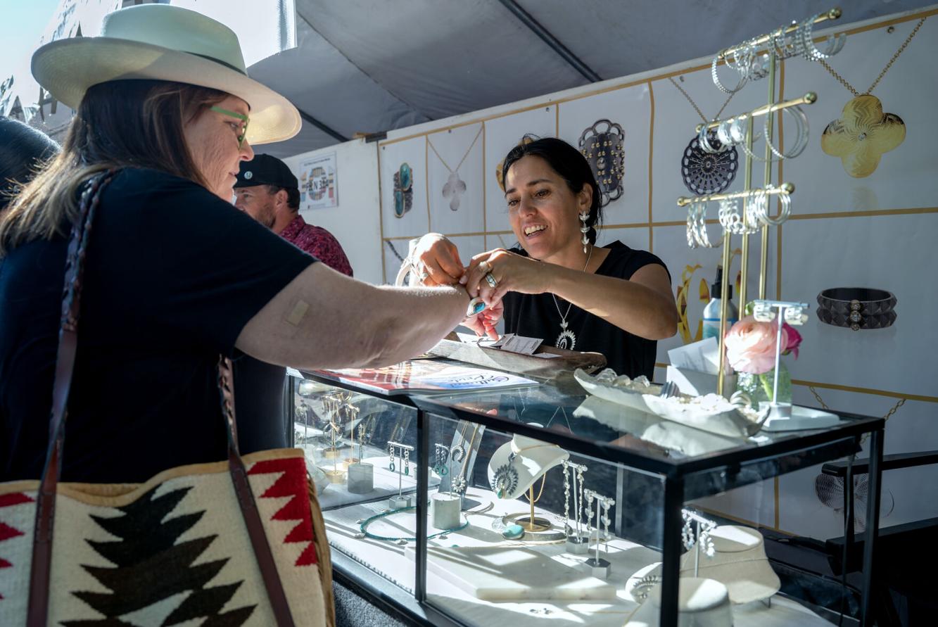 Over 1,000 artists and thousands of people fill the Santa Fe Indian