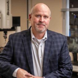 Dart Controls Names John Burch as President