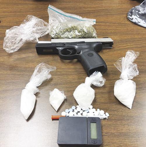 Alleged meth, marijuana, gun found in truck