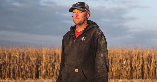 Shawn Feikema standing in field