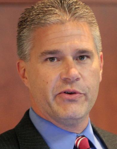 J.B. Van Hollen sues Everest College