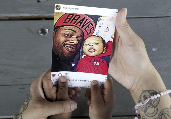 Jessica Marias, JaMichael Meaderds holding photo