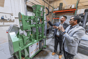 pellet-making equipment at Iowa State University’s BioCentury Research Farm