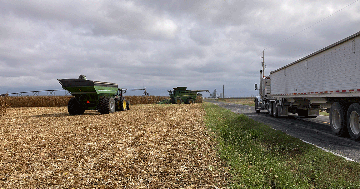 semi and grain wagon