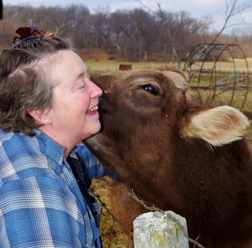 Betty Anderson with Jersey cow