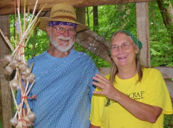 Harry Pulliam and Grace McLaughlin in garlic shed