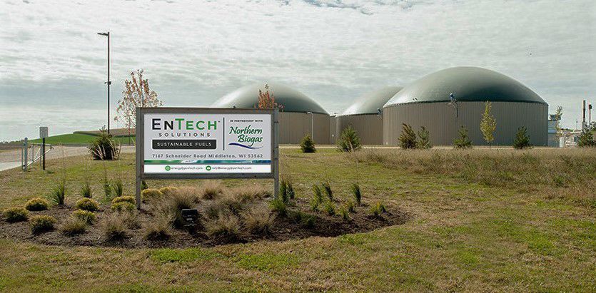 Biogas facility with EnTech Solutions and Northern Biogas sign