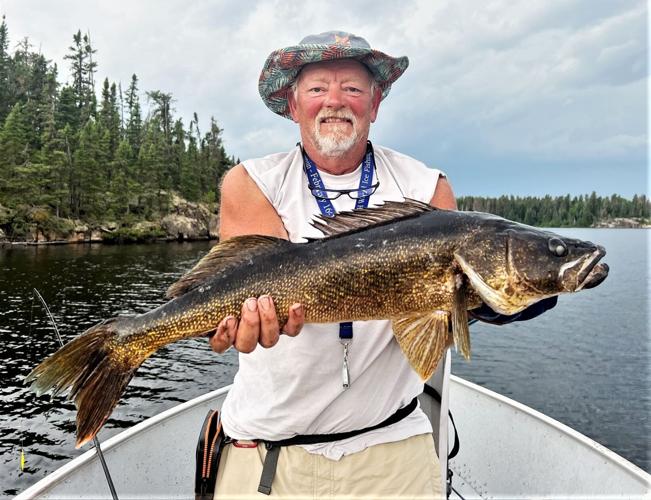 Roger Frank with walleye