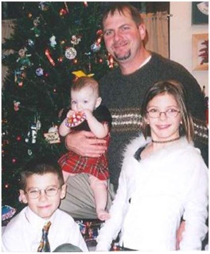Bill Lambert and his three children, 2002