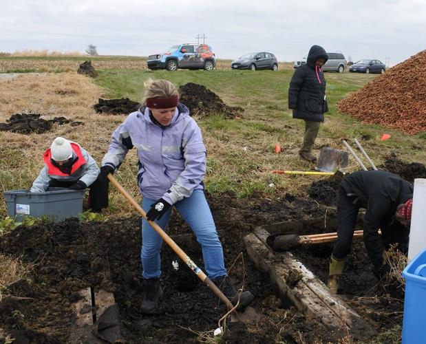 Soupir works with students