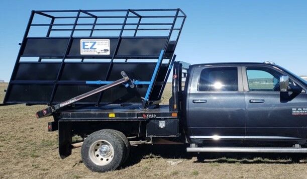 North Dakota rancher creates bale bed chute loader
