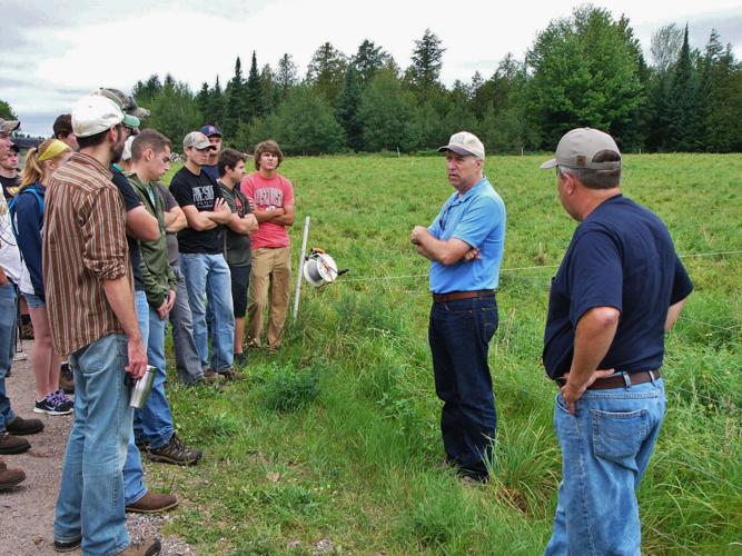 Paul Daigle and Tom Daigle talk to group
