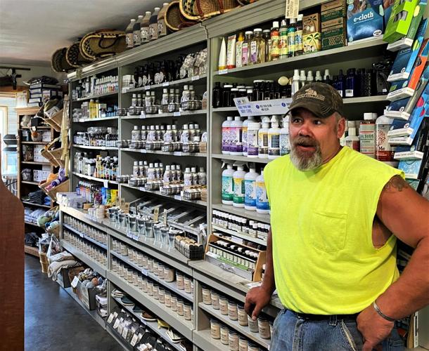 Brian Michielson near soap, lotion display