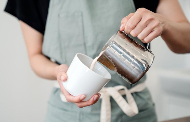 Pouring oat milk