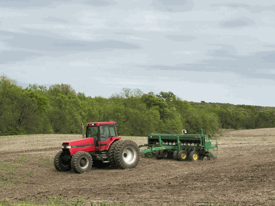 tractor tiller in field