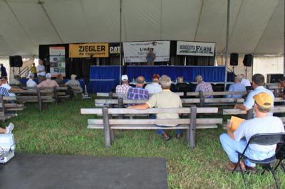 John Sanow, DTN market analyst, speaks at Farmfest 2011 in early August.