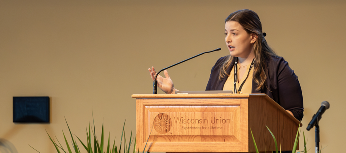 McGuire speaking at conference