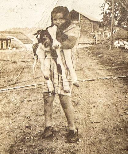 Ann Van Dunk with calf