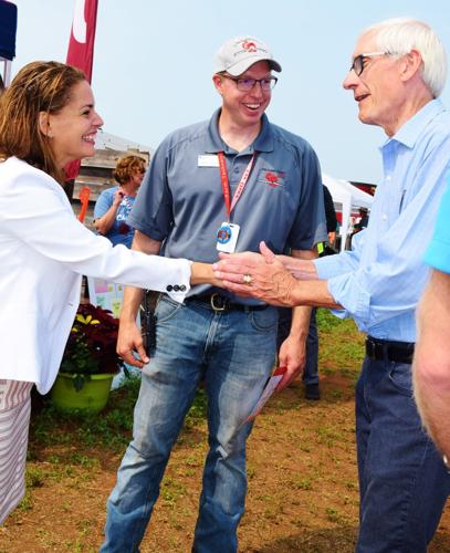 Gov. Tony Evers, Sunem Beaton-Garcia and Adam Wehling