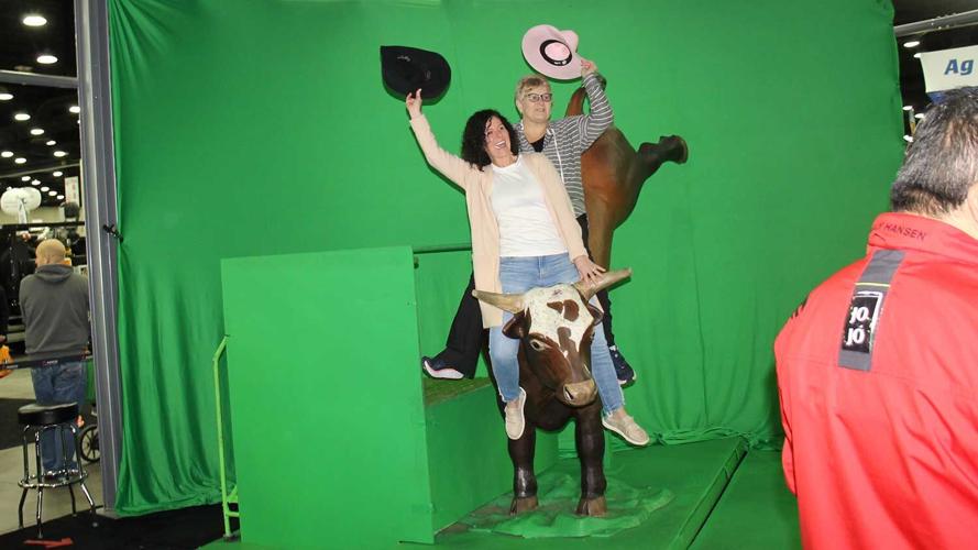 Toni Hohenbury and Amy Pendar ride the Hesston bull