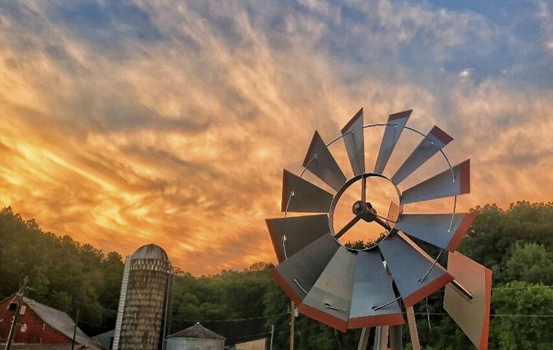 Windmill and storm clouds