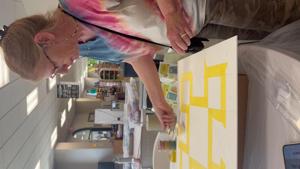 Instructors guide barn quilt painting techniques
