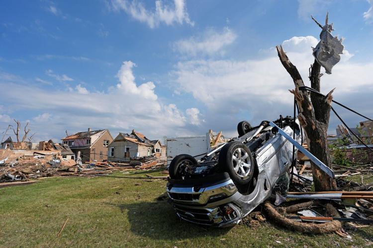 A destroyed truck lays upside down following severe weather, including a tornado Monday, July 27, 2026, in Menasha, Wisconsin.