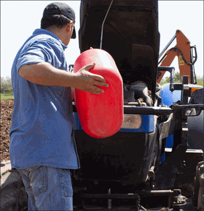 diesel poured into tractor