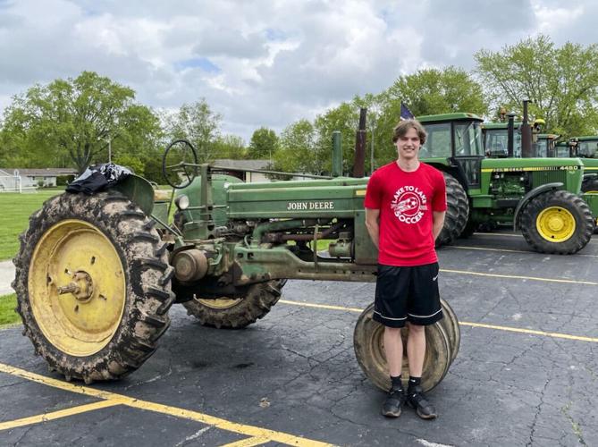 Matthew Schultz (his grandpa’s tractor) .jpg