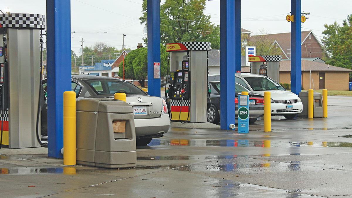 Cars at gas pump