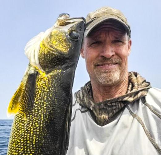 Mark Walters with walleye