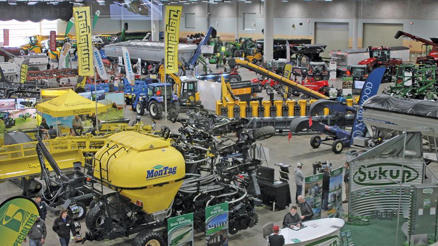 Farmers check out machinery at the Iowa Ag Expo