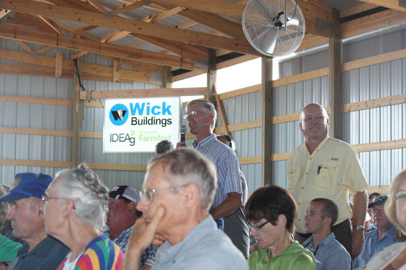 Kent Thiesse moderates forum during Farmfest