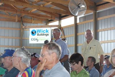 Kent Thiesse moderates forum during Farmfest